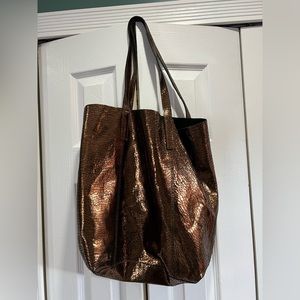 Bronze leather tote from Anthropologie, inner zipper pocket and case